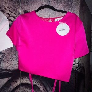 Brand new. Bright pink. Fuchsia. Boutique crop top. Tie up in the back.